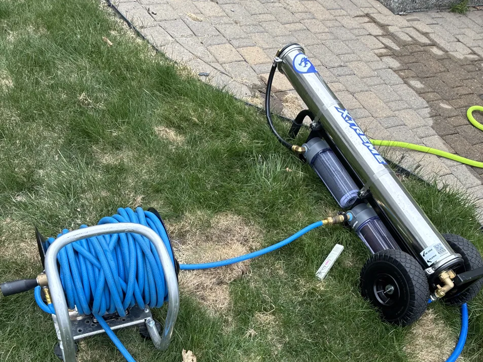 Pure water filtration system with hose reel